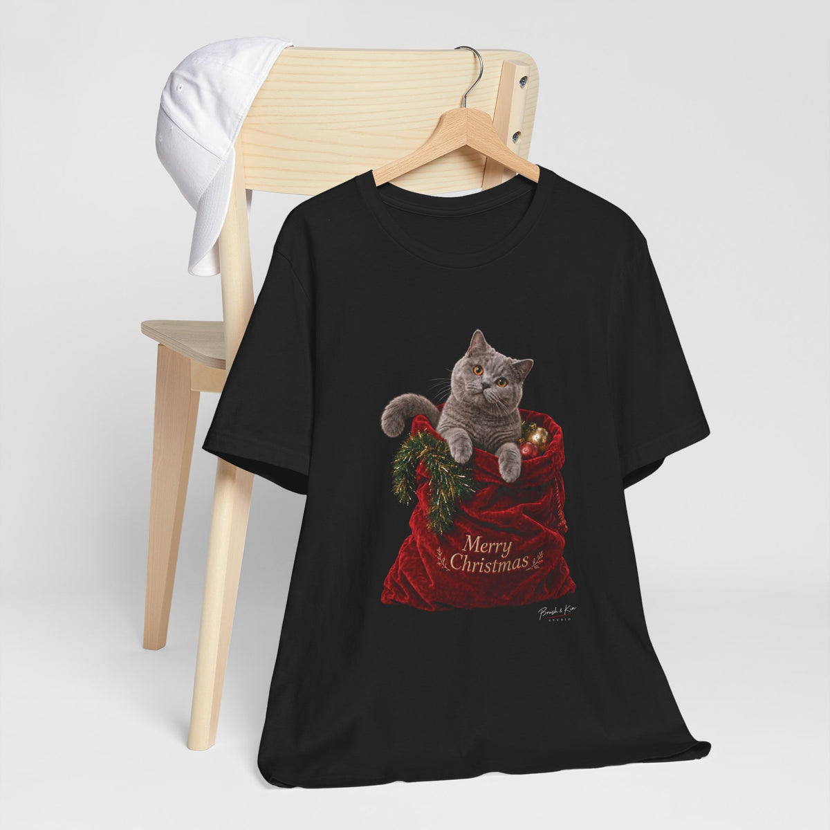 Christmas Cat Tee — "Merry Christmas" Kitty in Santa Sack T-Shirt